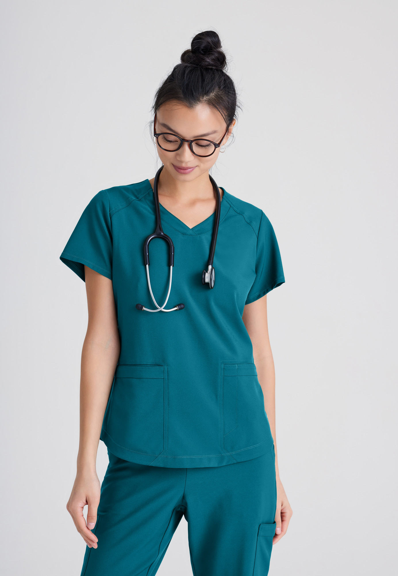 Close-up of quality scrub fabric and fit detail